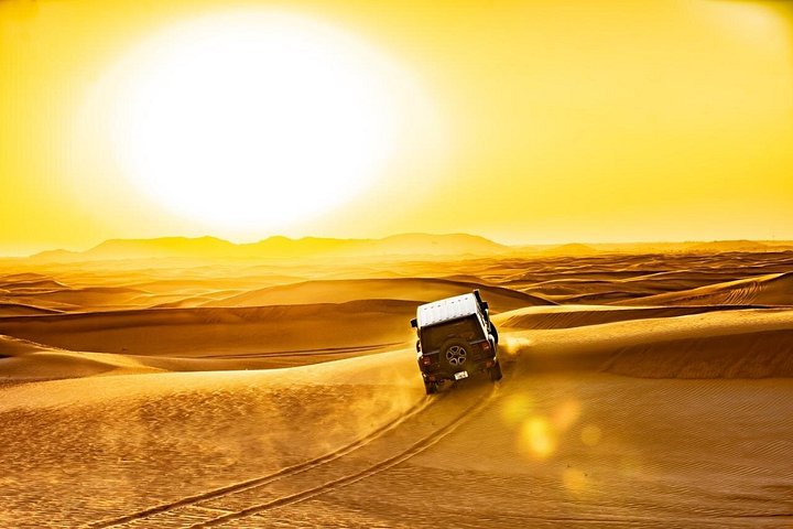 Experience a thrilling desert safari in Dubai with dune bashing, camel rides, and a BBQ dinner, photo 7 | wizardtrip