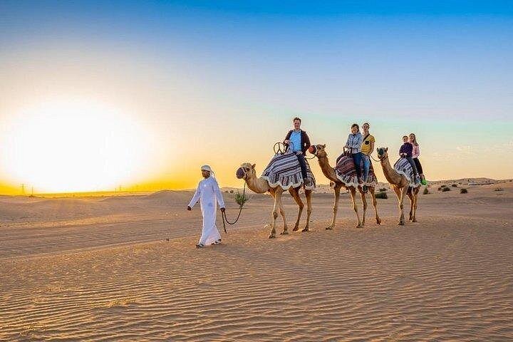 Experience a thrilling desert safari in Dubai with dune bashing, camel rides, and a BBQ dinner, photo 11 | wizardtrip