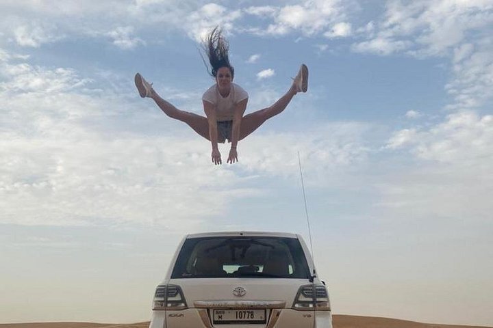 Experience a thrilling desert safari in Dubai with dune bashing, camel rides, and a BBQ dinner, photo 20 | wizardtrip