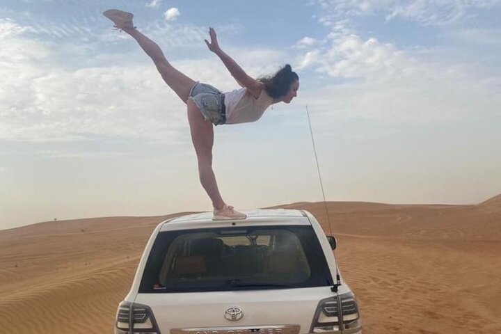 Experience a thrilling desert safari in Dubai with dune bashing, camel rides, and a BBQ dinner, photo 22 | wizardtrip