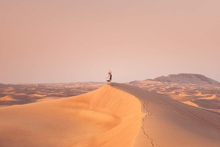 Experience a thrilling desert safari in Dubai with dune bashing, camel rides, and a BBQ dinner, photo 27 | wizardtrip