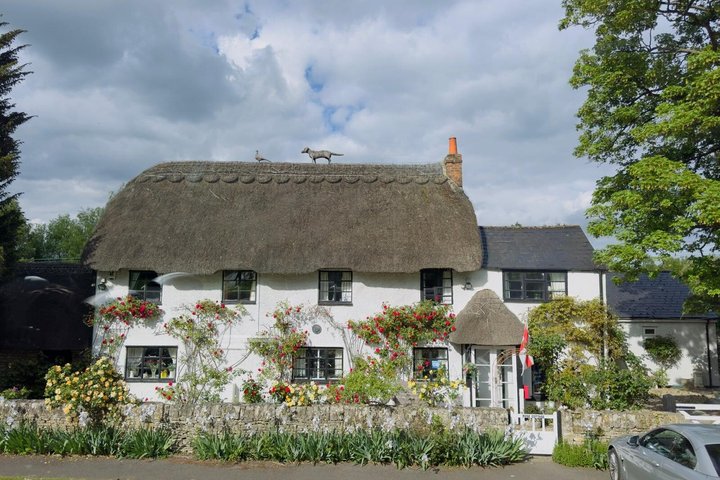 Day trip to the Cotswolds from London, featuring charming villages, rolling hills, and traditional architecture, photo 8 | wizardtrip