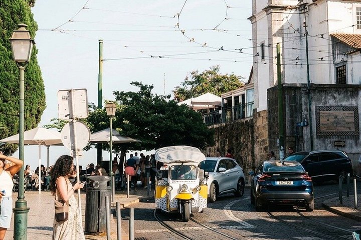 Private eco-tuk-tuk tour exploring Lisbon's historic sites and scenic viewpoints with local tastings, photo 7 | wizardtrip