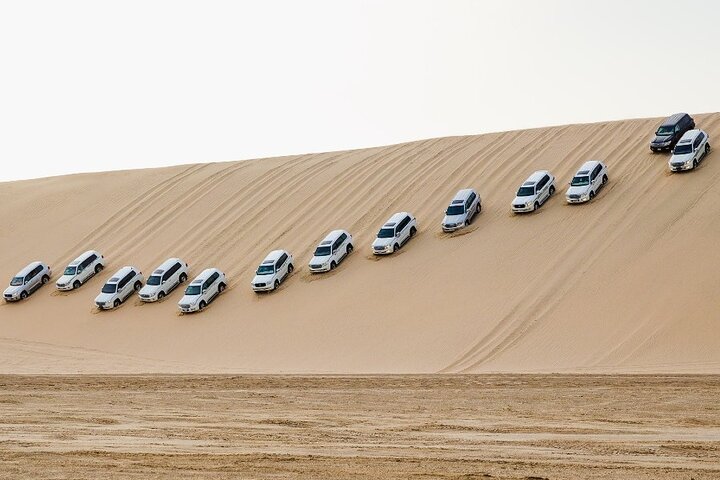 Upplev en spännande ökensafari i Doha, Qatar, med dune bashing, sandboarding och kamelridning, foto 17 | wizardtrip