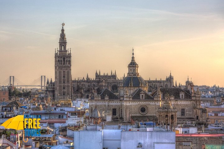 A guided walking tour exploring Seville's monumental landmarks and historic squares, photo 8 | wizardtrip