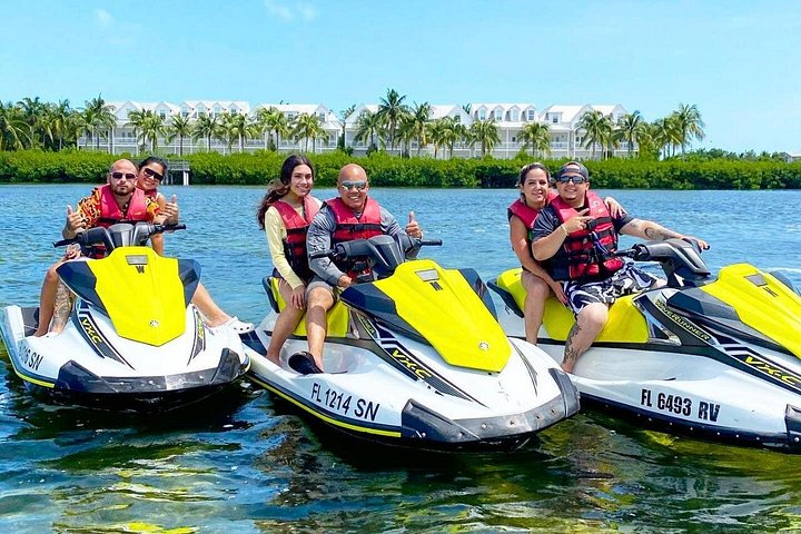 Thrill-seekers enjoy a guided jet ski tour around Key West, exploring scenic coastlines and famous landmarks, photo 12 | wizardtrip
