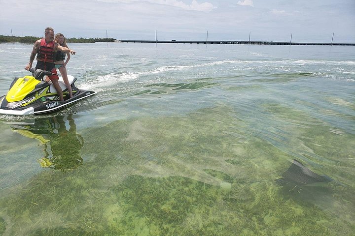 Thrill-seekers enjoy a guided jet ski tour around Key West, exploring scenic coastlines and famous landmarks, photo 13 | wizardtrip