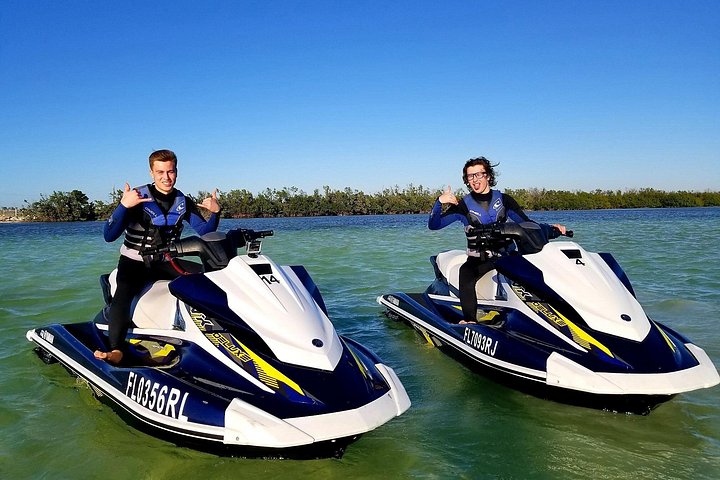 Thrill-seekers enjoy a guided jet ski tour around Key West, exploring scenic coastlines and famous landmarks, photo 16 | wizardtrip