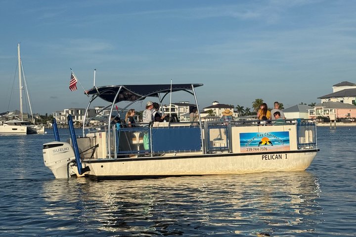 Geniet van een dolfijnencruise bij zonsondergang in Fort Myers Beach, Florida, met uitzicht op de Sanibel Lighthouse, foto 9 | wizardtrip