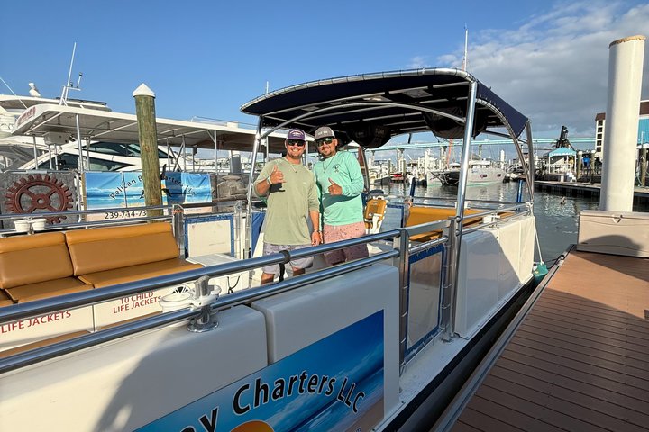 Geniet van een dolfijnencruise bij zonsondergang in Fort Myers Beach, Florida, met uitzicht op de Sanibel Lighthouse, foto 11 | wizardtrip