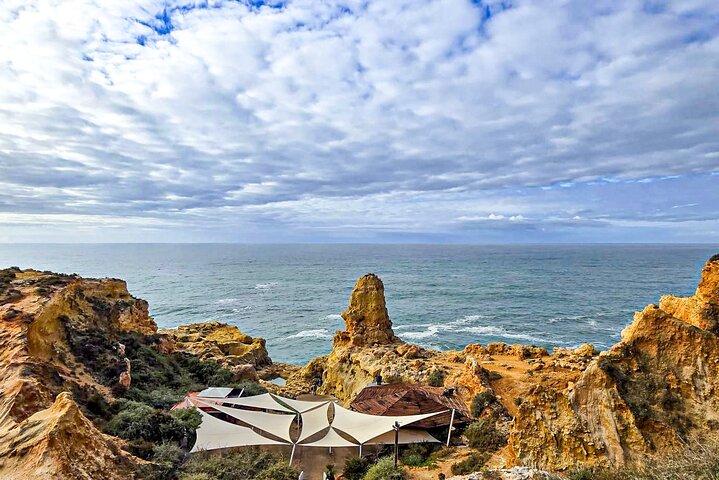 Guided hiking tour along the Algarve coast, exploring cliffs, caves, and beaches near Faro, Portugal, photo 10 | wizardtrip