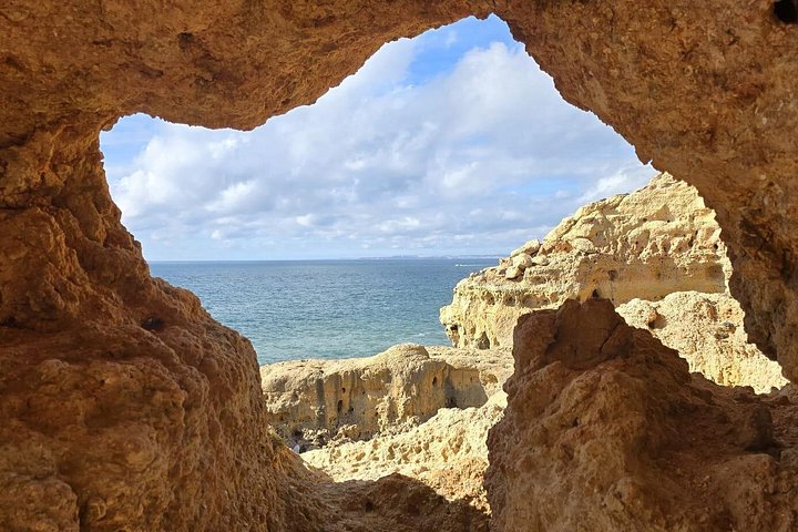 Guided hiking tour along the Algarve coast, exploring cliffs, caves, and beaches near Faro, Portugal, photo 12 | wizardtrip