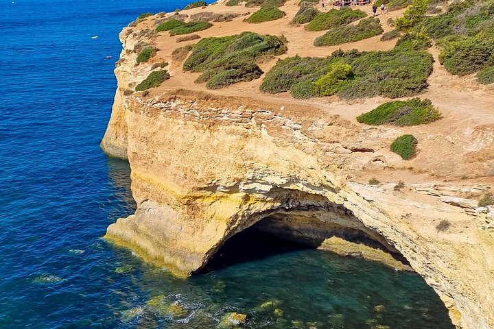 Guided hiking tour along the Algarve coast, exploring cliffs, caves, and beaches near Faro, Portugal, photo 15 | wizardtrip