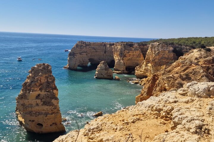 Guided hiking tour along the Algarve coast, exploring cliffs, caves, and beaches near Faro, Portugal, photo 31 | wizardtrip
