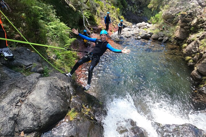 Beginner canyoning adventure in Madeira with rappels, jumps, and slides in a natural park, photo 6 | wizardtrip