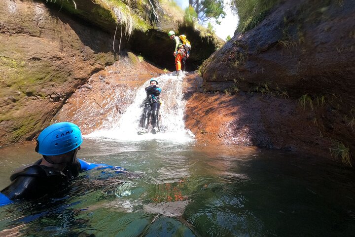 Beginner canyoning adventure in Madeira with rappels, jumps, and slides in a natural park, photo 9 | wizardtrip