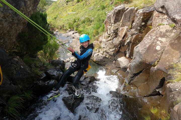 Beginner canyoning adventure in Madeira with rappels, jumps, and slides in a natural park, photo 15 | wizardtrip