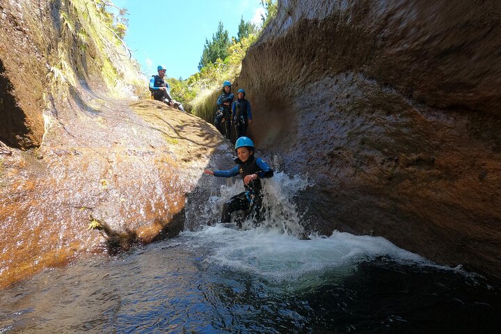 Beginner canyoning adventure in Madeira with rappels, jumps, and slides in a natural park, photo 18 | wizardtrip