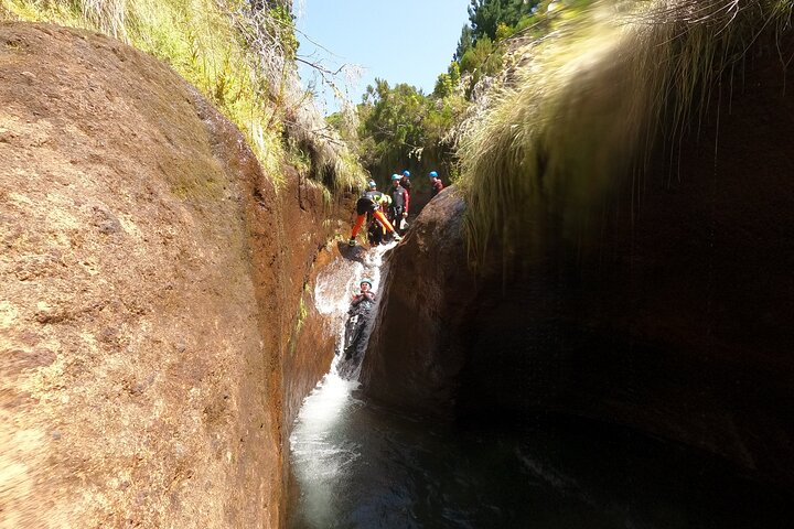 Beginner canyoning adventure in Madeira with rappels, jumps, and slides in a natural park, photo 19 | wizardtrip