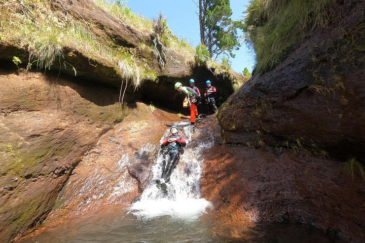 Beginner canyoning adventure in Madeira with rappels, jumps, and slides in a natural park, photo 20 | wizardtrip