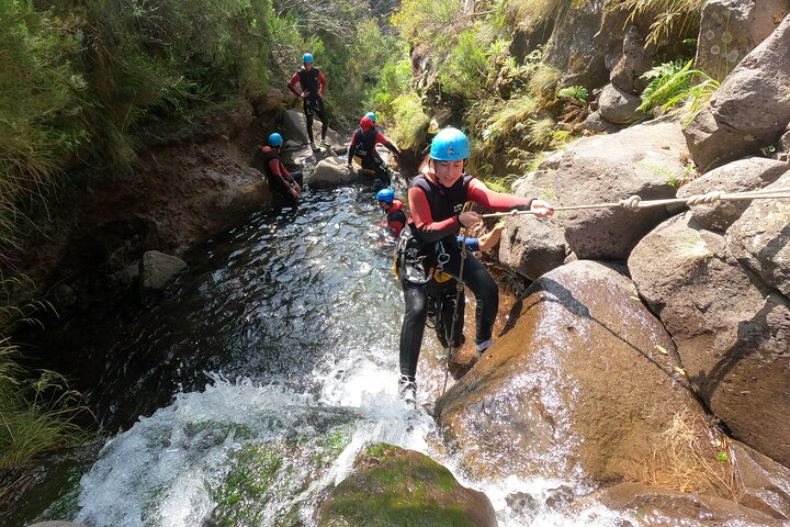 Beginner canyoning adventure in Madeira with rappels, jumps, and slides in a natural park, photo 24 | wizardtrip