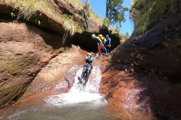 Beginner canyoning adventure in Madeira with rappels, jumps, and slides in a natural park, photo 31 | wizardtrip