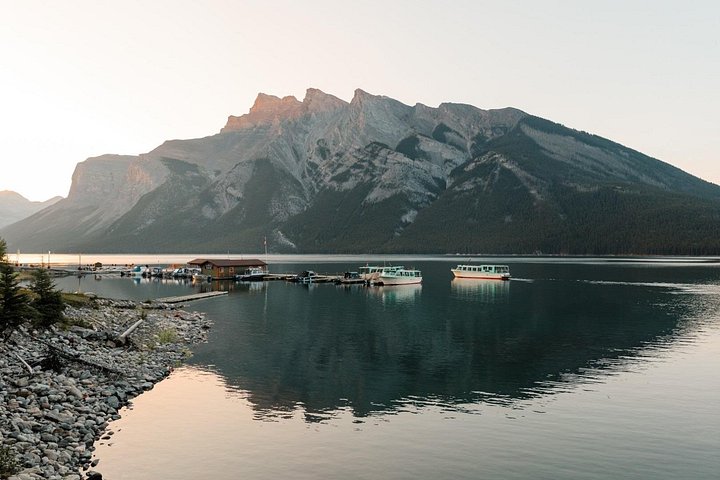 Scenic boat tour on Lake Minnewanka in Banff National Park, Canada, showcasing mountains and water, photo 11 | wizardtrip