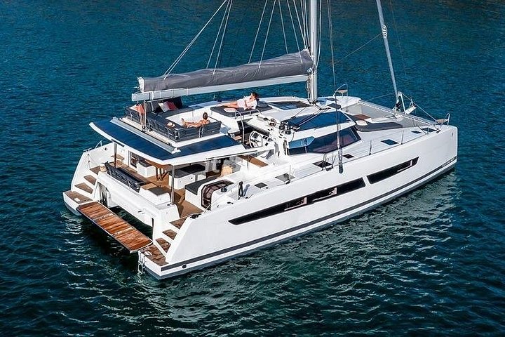 Mykonos: Brand-New Catamaran Cruise with Meal, Drinks & Transport | wizardtrip