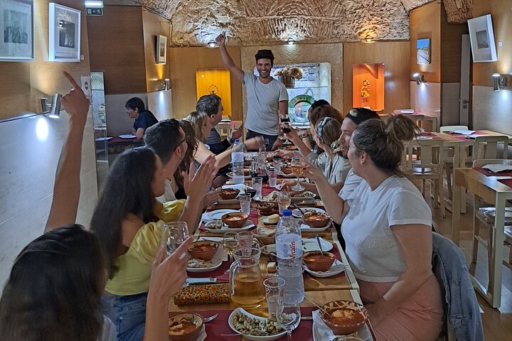 Lisbon food tour with local tastings and wine in historic neighborhoods, photo 7 | wizardtrip