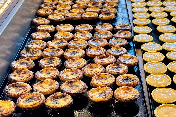 Lisbon food tour with local tastings and wine in historic neighborhoods, photo 16 | wizardtrip