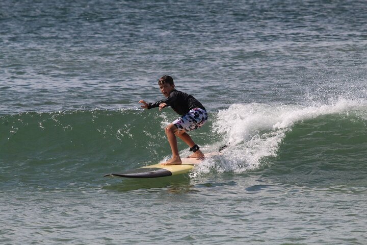 Apprenez à surfer avec des moniteurs professionnels sur les vagues douces de Tamarindo, Costa Rica, photo 11 | wizardtrip