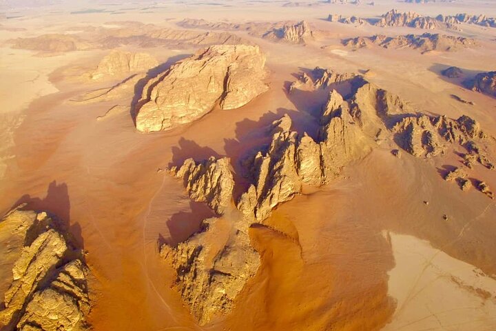 Full day tour from Amman to Petra and Wadi Rum, featuring ancient Nabataean architecture and desert landscapes, photo 8 | wizardtrip