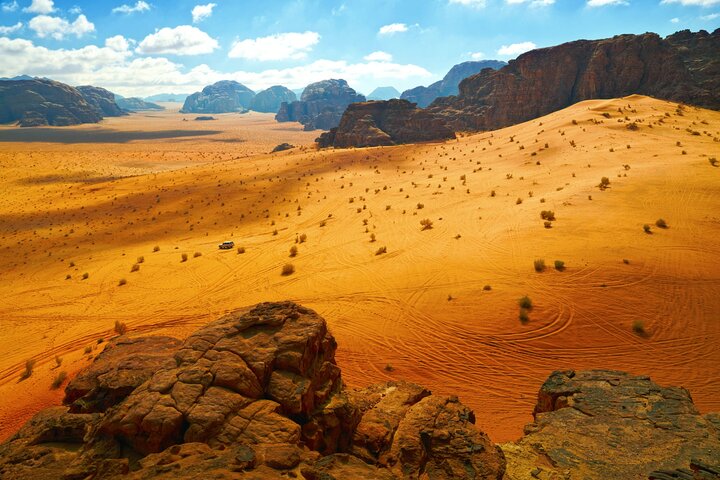 Full day tour from Amman to Petra and Wadi Rum, featuring ancient Nabataean architecture and desert landscapes, photo 12 | wizardtrip