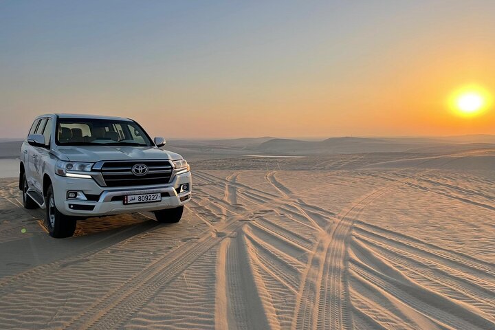 Experimente um emocionante safari no deserto em Doha, Catar, com dune bashing, passeios de camelo e sandboard, foto 6 | wizardtrip