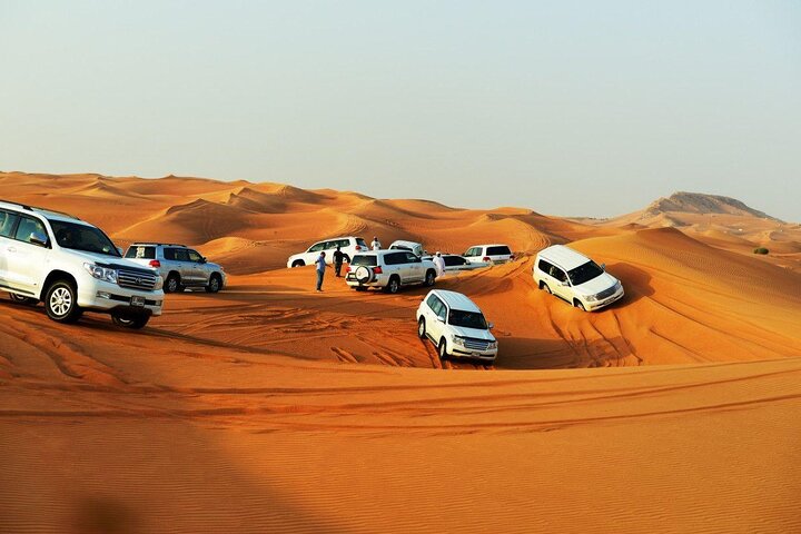 Experimente um emocionante safari no deserto em Doha, Catar, com dune bashing, passeios de camelo e sandboard, foto 7 | wizardtrip