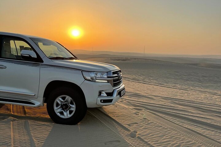 Experimente um emocionante safari no deserto em Doha, Catar, com dune bashing, passeios de camelo e sandboard, foto 11 | wizardtrip