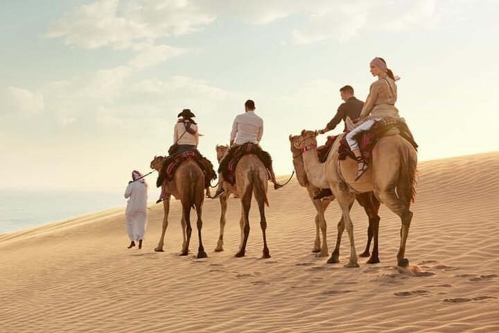 Experimente um emocionante safari no deserto em Doha, Catar, com dune bashing, passeios de camelo e sandboard, foto 16 | wizardtrip
