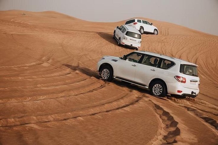Découvrez un safari VIP dans le désert à Dubaï avec dunebashing, balades à dos de chameau, spectacles en direct et dîner BBQ, photo 14 | wizardtrip