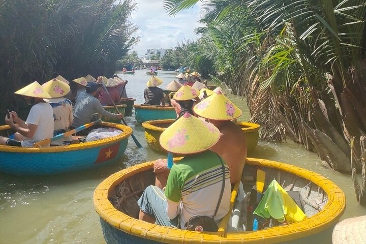 Upplev en traditionell vietnamesisk korgbåtstur genom Hoi Ans natursköna kokosskog, njut av lokal kultur och aktiviteter, foto 7 | wizardtrip