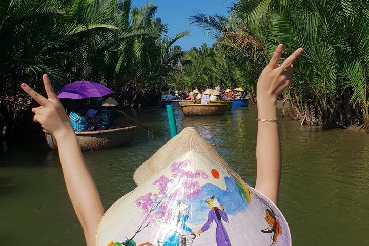 Upplev en traditionell vietnamesisk korgbåtstur genom Hoi Ans natursköna kokosskog, njut av lokal kultur och aktiviteter, foto 11 | wizardtrip