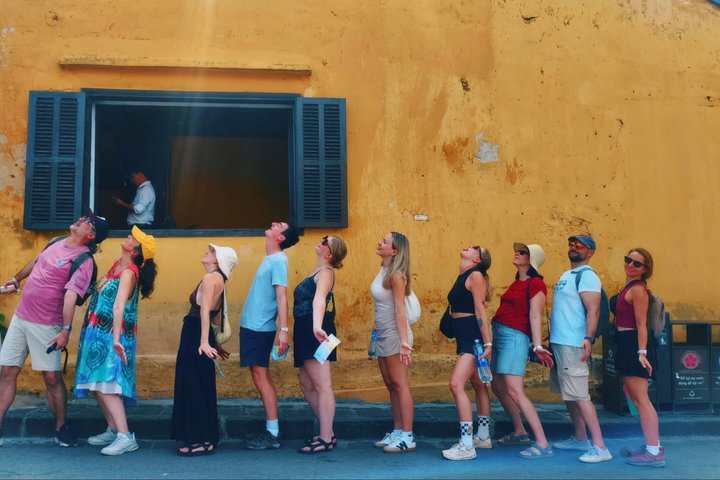 Guided walking tour of Hoi An Ancient Town, Vietnam, showcasing historic architecture and local culture, photo 38 | wizardtrip