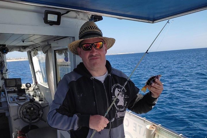 Excursión en barco de pesca tradicional en Rodas, Grecia, con pesca, natación y barbacoa a bordo, foto 15 | wizardtrip