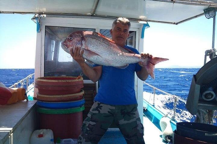 Excursión en barco de pesca tradicional en Rodas, Grecia, con pesca, natación y barbacoa a bordo, foto 44 | wizardtrip