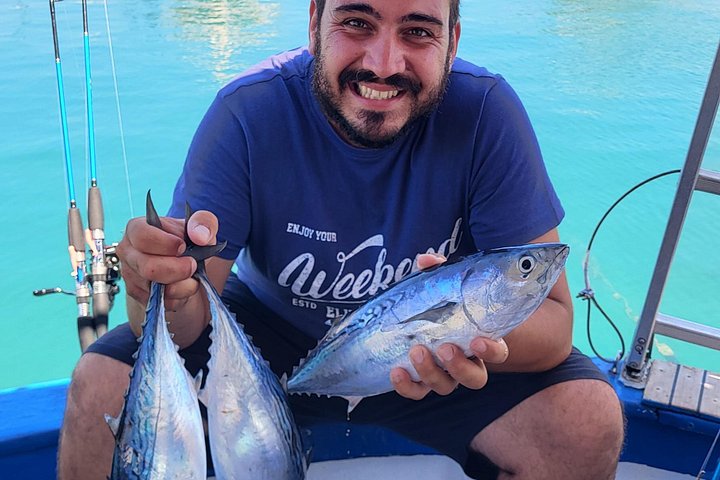 Excursión en barco de pesca tradicional en Rodas, Grecia, con pesca, natación y barbacoa a bordo, foto 47 | wizardtrip