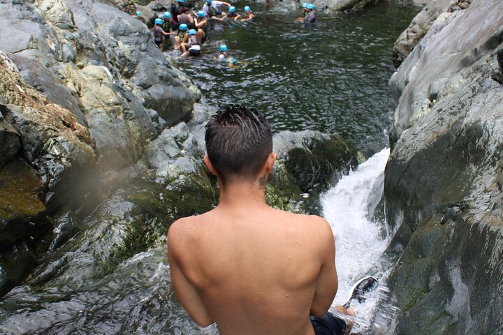 Découvrez les toboggans naturels et l'écosystème luxuriant de la forêt nationale d'El Yunque lors de cette visite guidée depuis San Juan, photo 8 | wizardtrip