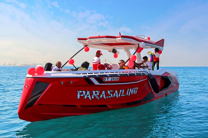 Upplev spännande parasailing över Dubais vatten med fantastisk utsikt över Palm Jumeirah och JBR, foto 10 | wizardtrip