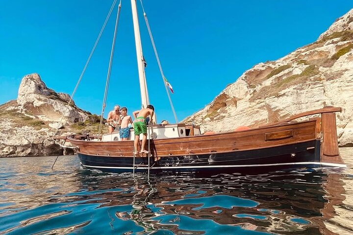 Cagliari Boat Tour: 4 Swim Stops, Snorkeling & Sardinian Aperitif | wizardtrip