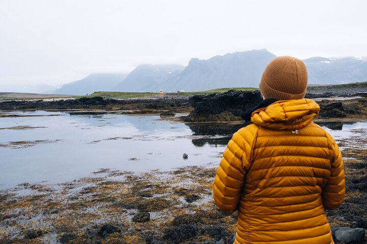 Explore a diversa Península de Snaefellsnes da Islândia, com a montanha Kirkjufell, praias de areia preta e glaciares, foto 18 | wizardtrip