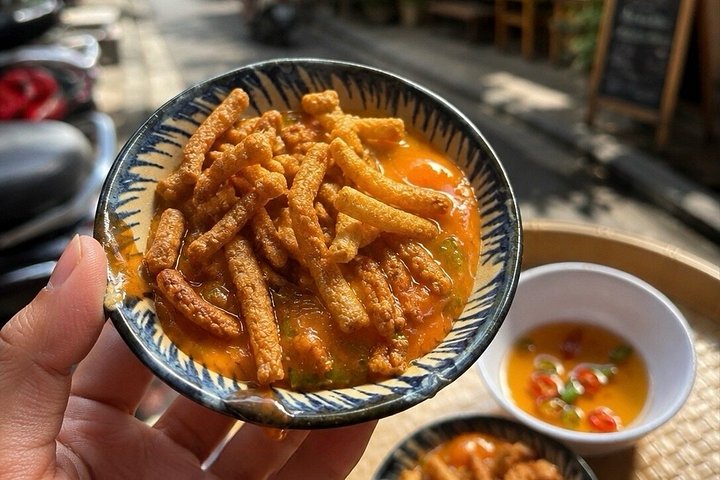 Utforska Hoi Ans livliga gatumatscen med en lokal guide, foto 9 | wizardtrip