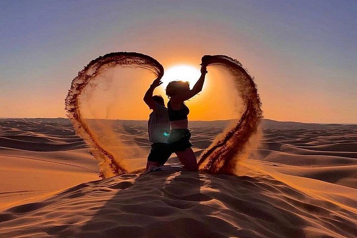 Experience a Dubai desert safari with dune bashing, camel rides, live shows, and BBQ dinner, photo 11 | wizardtrip